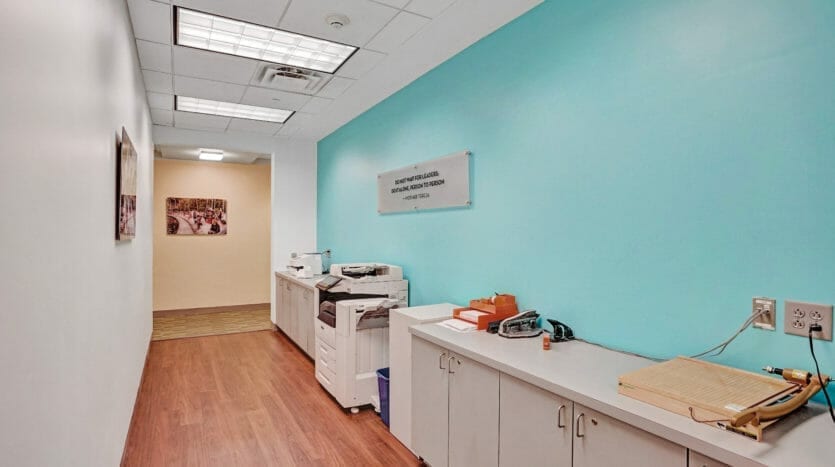 Area designated to office supplies and copier at Carr Workplaces Las Olas