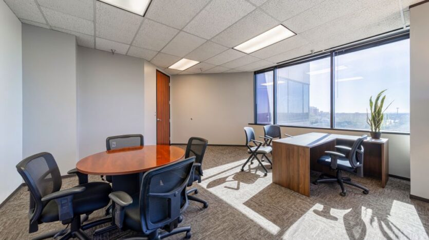 Window office with meeting room table
